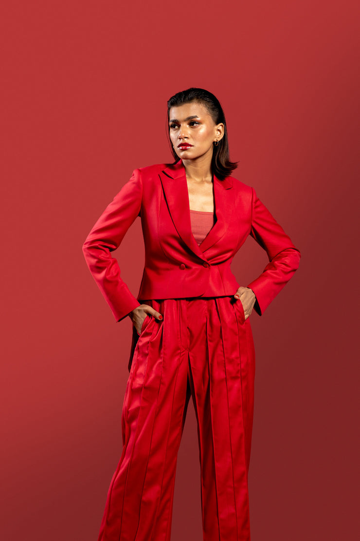 Modern Red 2-Piece Suit for Women: Pleated Pants & Long Tail Crop Blazer.