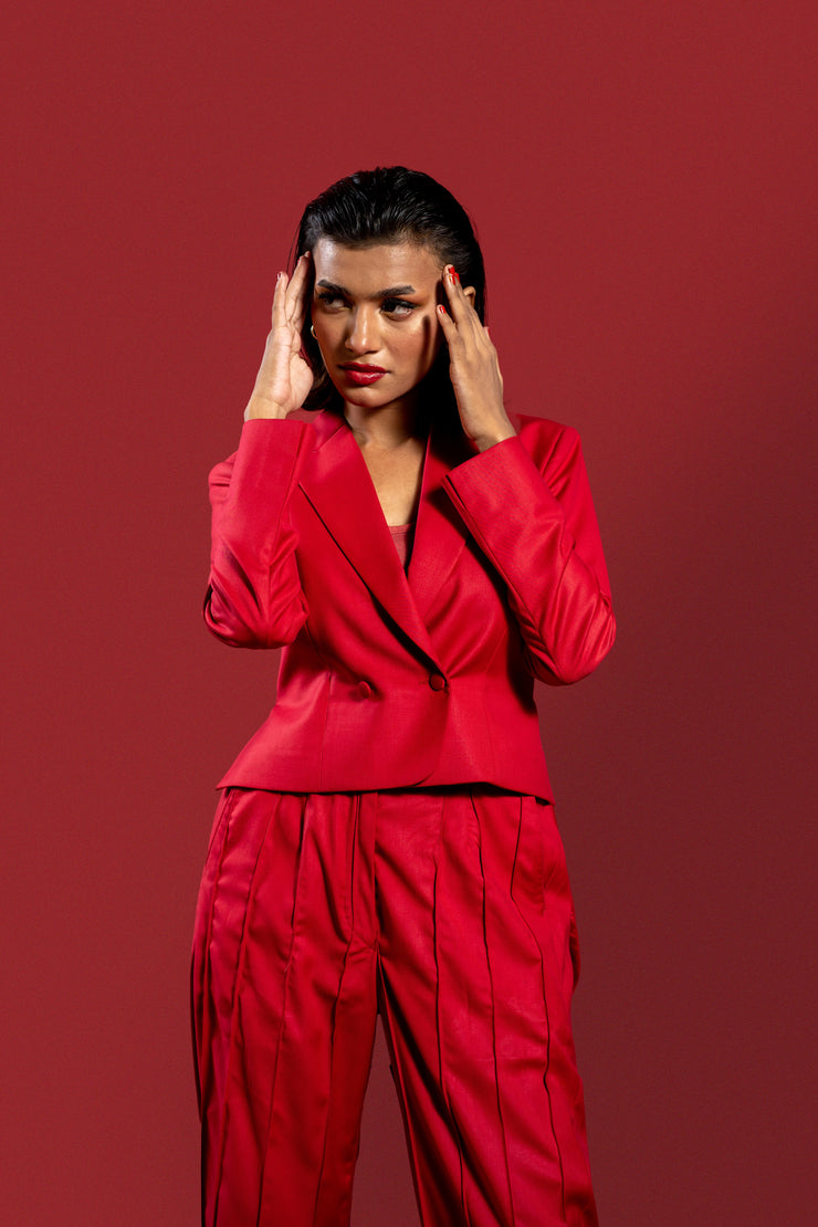 Modern Red 2-Piece Suit for Women: Pleated Pants & Long Tail Crop Blazer.